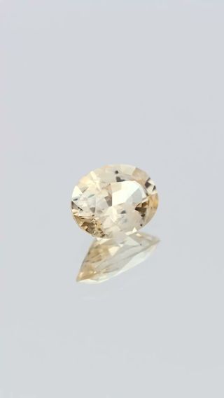 360-degree-macro-view-natural-yellow-sapphire-unheated-oval-ceylon-0.95ct thumbnail 2