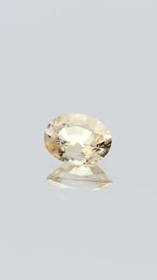 360-degree-macro-view-natural-yellow-sapphire-unheated-oval-ceylon-0.95ct thumbnail 3