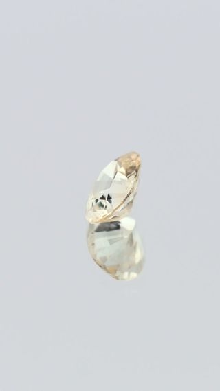 360-degree-macro-view-natural-yellow-sapphire-unheated-oval-ceylon-0.95ct thumbnail 5