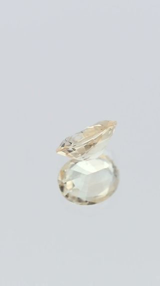 360-degree-macro-view-natural-yellow-sapphire-unheated-oval-ceylon-0.95ct thumbnail 6