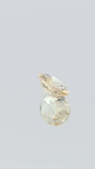 360-degree-macro-view-natural-yellow-sapphire-unheated-oval-ceylon-0.95ct thumbnail 8
